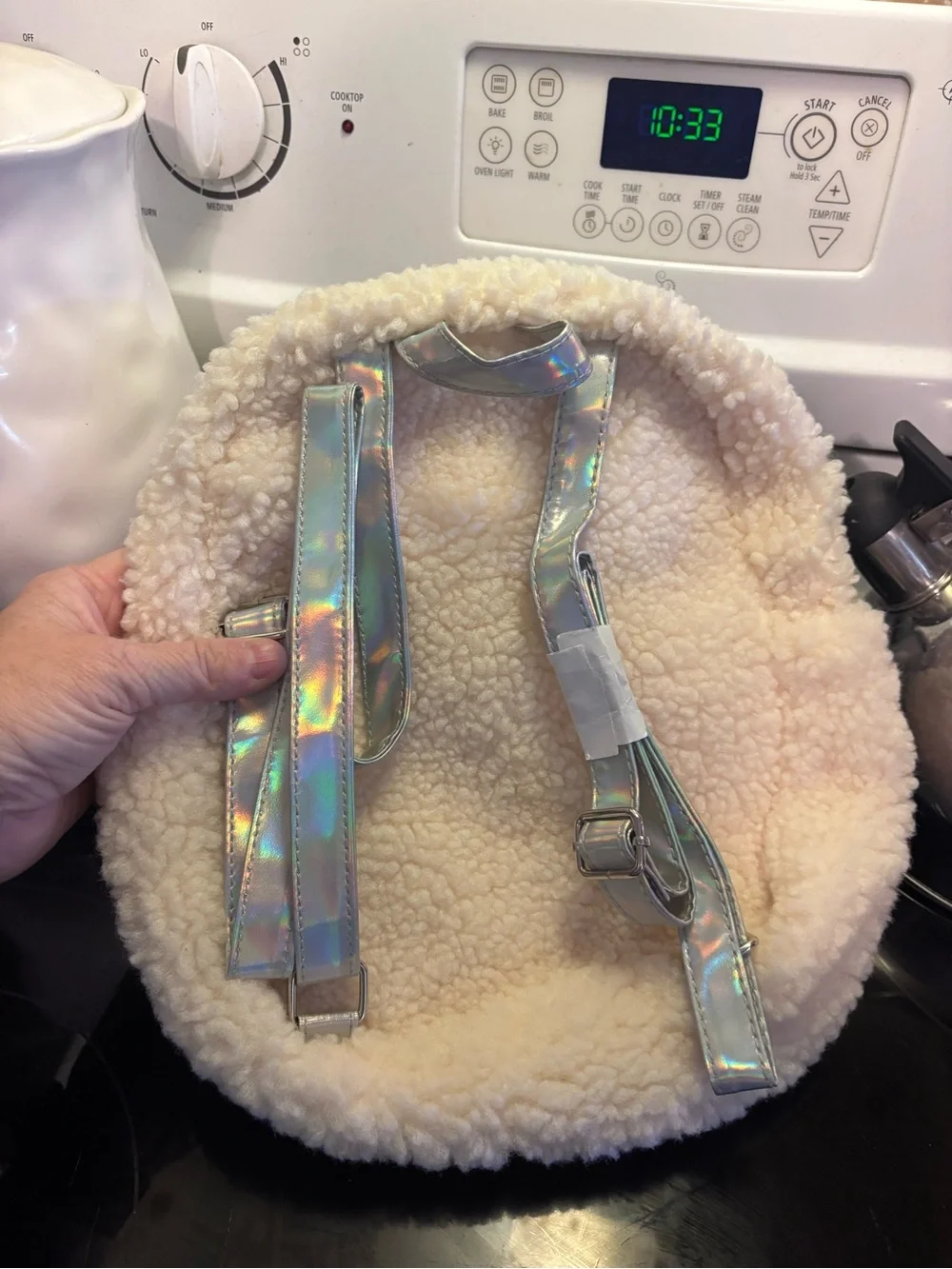 Justice Cream Sherpa Mini Backpack with Aqua Front Pocket and Holographic Straps